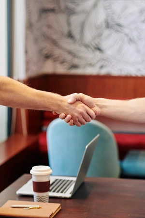 business-people-shaking-hands-2023-11-27-05-15-12-utc.jpg